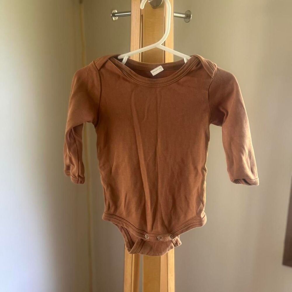Kate Quinn brown bodysuit for baby